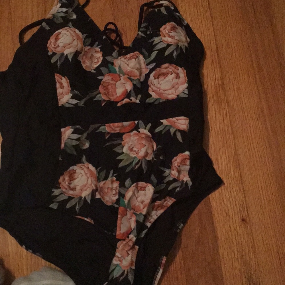 Never worn one piece